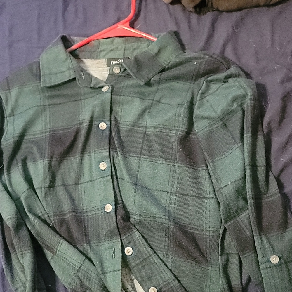green and black button up flannel